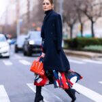 Olivia Palermo Instagram - Vroom vroom 🏎️💨 Red hot with the new @ferraristyle mini bag 👜 #adv #ferraristyle New York, New York
