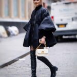 Olivia Palermo Instagram - Power Puff Girl 🖤 📷: @thestewartofny 🧥: @simonerocha_ 👕: @burberry 🩳: @zara 👢: @stuartweitzman 👛: @dior New York, New York