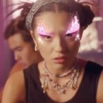 Olivia Rodrigo Instagram – brutal music video is out now! had the best time ever making this. so so so grateful for @petrafcollins who constantly inspires me and who directed this video so incredibly. hope u guys love the vid and all my teen angst lol. 🔪🔮🦋💜🌈