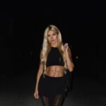 Pamela Reif Instagram – anzeige | a golden light in the dark 🪩✨ sunset light might be my favorite – but I just bought myself a flash camera 👀👀👀😂 that worked preetttttyyyy good, right? Now we got a new level of “my favorite color is black” 

Wearing the new @calzedonia autumn / winter tights from the recent party collection 🪩 

#nightlife #backtobed #haha #calzedonia #feelgoodincalzedonia Ibiza, Spain