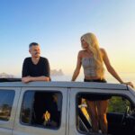 Pamela Reif Instagram - Anzeige I Uhhhh we got Dennis in front of the lense - das klappt einmal im Schaltjahr 🌞 maybe because he’s the main driver of this dusty colored baby 🚖 I’m always the one to say „you drive - I need to be on my phone“ hohoooo. In any case: we’ve never shown you our Ibiza car 🤓 We went for a @jeep Wrangler Sahara, with a panorama roof & the best color I could imagine on this dusty island. Going fast is not the main argument here - gliding elegantly over rocks and wannabe-streets, a Wrangler was almost a no brainer. It was love at first pothole (Schlagloch) 💌 Wir haben ihn genau so bei @autohauskoenig_de gefunden 🫶🏼 @jeep_deutschland #wrangler #jeep #ibiza #siblings #summer Ibiza, Spain