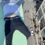 Parkourporpoise Instagram - Just hanging out over the city! #Rooftopstunt #adrenaline #reels Ps everybody looks like ants down there! 🐜🤪 Montreal, Quebec
