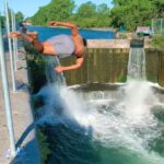 Parkourporpoise Instagram - I believe I can fly!✈️👌🏻 How many flips did I do?🤔 #summer #flips #cliffjumping #adrenaline Montreal, Quebec