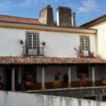 Patricia Heaton Instagram - On the way back to Lisbon from Nazaré we stopped in Óbidos, one of the most beautifully preserved villages I’ve ever visited. Beautiful cobbled streets lined with historic buildings drenched in flowers. Obidos Portugal