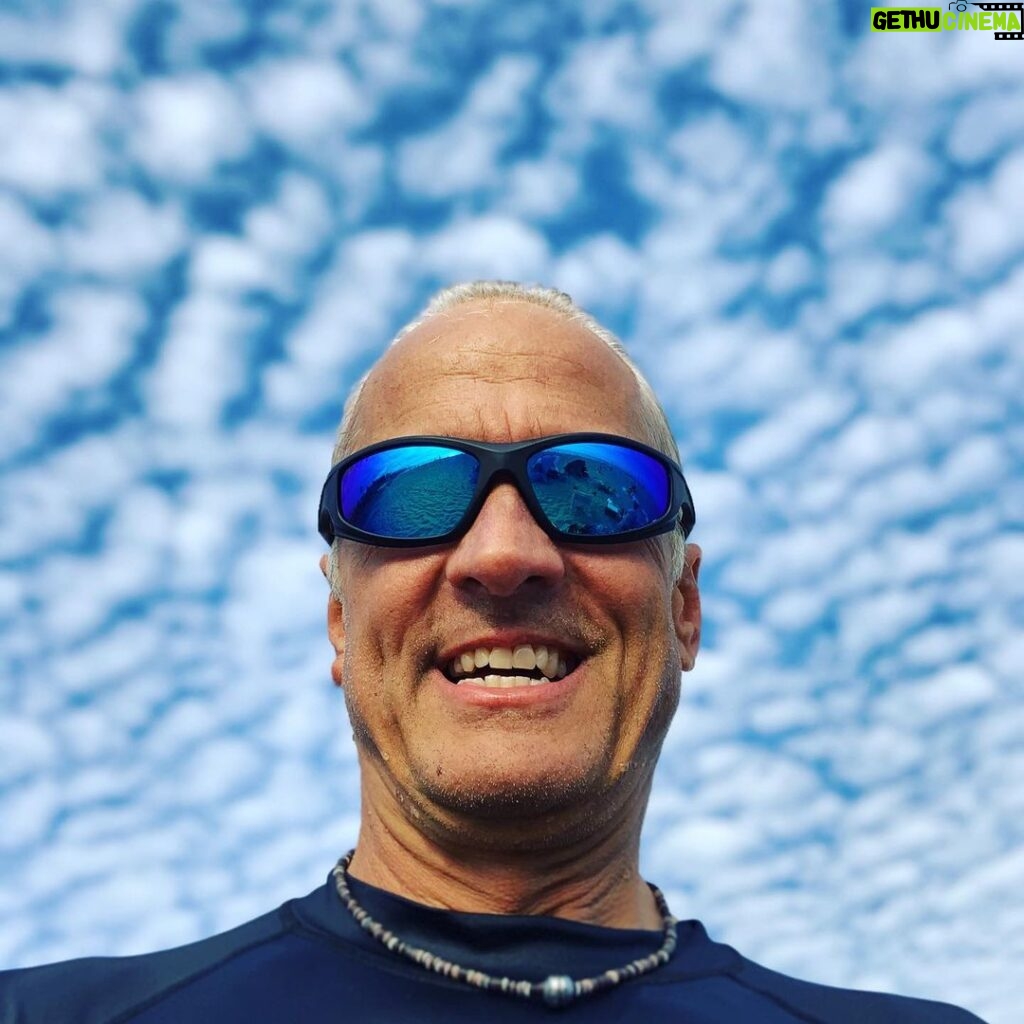 Patrick Fabian Instagram - Fresh outta the water from #worldswimday.....now swimming in clouds. . . #swim #ocean #water #nature #clouds @shadyrays #happy