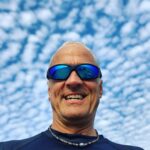 Patrick Fabian Instagram - Fresh outta the water from #worldswimday.....now swimming in clouds. . . #swim #ocean #water #nature #clouds @shadyrays #happy