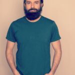Paul Walling Instagram - Hi! I put on a clean shirt (but not clean jeans), left my apartment (but not my neighborhood), and even doffed my mask for a bit (but not my beard.) 📷: @gregendries 👕: @shop.perk 💪: 🍝🍜