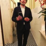 Paul Walling Instagram - After you celebrate the engagement of @lizstormy and @storm_adam 🥂, you grab an apple, go to the men’s room and take a pic. That’s just Hollywood law. Chateau Marmont
