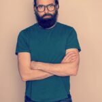 Paul Walling Instagram - Hi! I put on a clean shirt (but not clean jeans), left my apartment (but not my neighborhood), and even doffed my mask for a bit (but not my beard.) 📷: @gregendries 👕: @shop.perk 💪: 🍝🍜