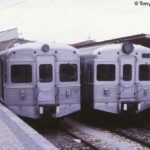 Pedro Ribeiro Instagram - Há uns dias, pela primeira vez em muitos anos, fiz a viagem de comboio entre Cascais e o Cais do Sodré. Foi nostálgico. Sobretudo ali a partir de Oeiras: as estações de Santo Amaro, (com a ponte que atravessei a pé, vezes sem conta, para ir para o Liceu de Oeiras) e Paço de Arcos (depois de passar à frente d’A Minha Escola, onde fiz a primária) Ainda me lembro do antigo esquema de cores e números, que identificavam os destinos: ⚪️ 0 - À noite, a parar em todas. 🟡 2 e 🔵 3 - O rápido para Cascais 🟠 o 6, que só ia até S.Pedro 🟢 7 e 🔴 8 para Oeiras E o 9 🟤 que só ia até Algés. Lembro-me de existir uma estação em Pedrouços. Lembro-me do ramal para a estação do Estádio Nacional, que já era uma ruína quando eu era miúdo, e hoje já não existe. Lembro o comboio que apanhava às 21:33 em Santo Amaro, para ir trabalhar para o CMR. Passar de uma carruagem para a outra, vendo a linha por baixo dos pés, e aquele barulho. Escolher o lugar da frente, da primeira carruagem, o fascínio de espreitar para a cabine do maquinista… Gosto de comboios, e a Linha de Cascais é a da minha infância. Foi mesmo bom voltar lá.
