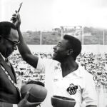 Pelé Instagram – No dia 04 de fevereiro de 1969, uma excursão do @santosfc de Rei Pelé pela África fez parar a Guerra do Biafra, também conhecida como Guerra Civil Nigeriana. Tudo para ver o time jogar na cidade de Benin, na Nigéria. Uma trégua na violência. Um dia de paz, em paixão ao esporte. Um marco na história de Pelé, que sempre pregou o amor. 
.
On February 4, 1969, a tour led by King Pelé’s @santosfc through Africa played a significant role in halting the Biafra War, also known as the Nigerian Civil War. Everything came to a pause as people gathered to watch the team play in Benin City, Nigeria. A truce emerged amid the violence, marking a day of peace fueled by the shared passion for sport. This event stands as a milestone in Pelé’s history, reflecting his enduring commitment to promoting love.