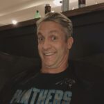 Penn Holderness Instagram – Home Alone update- Kim is back. And I am at a football party at my buddy’s house. He bet me that I couldn’t sit on the couch for 3 hours without getting up. I really have to pee. One hour left. I need some motivaCHIN.