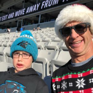 Penn Holderness Instagram - Little guys bday present. An hour early but he wants to watch all the warm ups. Early admiCHIN. #doublechinstagram #pantherselfie