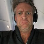 Penn Holderness Instagram - That is the face of a man who was just told that after sitting on a runway for 2 and a half hours, we have to go back to the gate because “it’s too busy out here”. I don’t even have any chin puns. That’s how mad I am. Don’t ever fly on a plane with me and Kim. Run the other way. We are jinxes. LaGuardia Airport