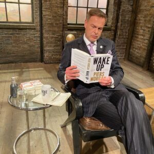 Peter Jones Instagram - No better way to spend my time in between pitches... WAKE UP! @piersmorgan