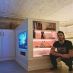 PewDiePie Instagram - I built a mf closet gamers.. 😤😤😤 Sometimes you just gotta real life Minecraft, ya know? We have this akward space in front of our bed that goes up from the floor. It kind of blocks away space and ends up piling up mess. So, decided to extend the closet from the wall out over and also build the TV into it. Marzia had the great idea to put a bookshelf on the end. On the backside of it, there's sliding doors with shelves for storage inside. Shoutout to my neighbour for letting me borrow his garage and tools 👍and mertz for helping me paint it and also my dad for giving advise. Never built anything this big in wood before, but was really fun and turned out not too shabby. 🙉