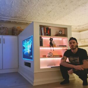PewDiePie Instagram - I built a mf closet gamers.. 😤😤😤 Sometimes you just gotta real life Minecraft, ya know?
We have this akward space in front of our bed that goes up from the floor. It kind of blocks away space and ends up piling up mess. 
So, decided to extend the closet from the wall out over and also build the TV into it. Marzia had the great idea to put a bookshelf on the end. On the backside of it, there's sliding doors with shelves for storage inside.
Shoutout to my neighbour for letting me borrow his garage and tools 👍and mertz for helping me paint it and also my dad for giving advise. Never built anything this big in wood before, but was really fun and turned out not too shabby. 🙉