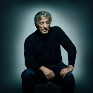 Platon Instagram - I photographed Tony Bennett a couple of times both in New York. I loved this man. He was sweet, humble and at peace with himself. He talked for hours about his love of music and musicians—Count Basie, Bill Evans, Billie Holiday, Buddy Rich, and of course, Sinatra, who had once described Tony as the “the best singer in the business.” Tony Bennett was also a painter and he compared the process of mixing colors with singing, especially singing jazz. I am showing you all two of my favorite pictures. I took the color image with my usual light and background. Tony, for a few brief moments, had paused—“What are you thinking about?” I asked. “Bill Evans’ sound,” he replied, “—solitude.” After we had packed up all the studio equipment it was time to leave. Tony was sitting by a window waiting for his lunch. A shaft of natural light caught his profile. Without saying anything I gently unpacked my Hasselblad and guessed the light reading [I didn’t want to disturb the moment]. I took four black and white frames and gently repacked my camera, thinking he hadn’t noticed. “Did you get it?” Tony asked without moving. “I got it,” I said. “My gift to you,” he replied. I left that day on an all time high. Some years later I was in LA with my mum. We were sitting in my favorite diner on Sunset Boulevard. I had some big news to deliver and I was shaking. “Mum,” I said, “I’m going to be a dad.” As my mum touched my hand, a song came on the jukebox—I LEFT MY HEART IN SAN FRANCISCO. We sat in silence listening to Tony Bennett’s beautiful reassuring sound and of course the song ended with the words “your golden sun will shine for me.” Tony Bennett—the day you passed, America lost a little bit of it’s soul. I salute you. Rest In Peace.