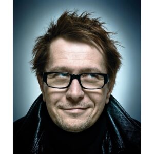 Platon Instagram - gary oldman. “I took this picture of Gary Oldman many years ago at Sundance Film Festival. He had just written and directed ‘Nil by Mouth’. It’s a dark, brutal depiction of working class London starring Ray Winstone and Kathy Burke. I love this portrait of Oldman, somehow, for a moment I tapped into his playful mischief. We all have a light and dark side to our soul, but great artists normally are pushed to both extremes. I’ve been studying Winston Churchill speeches a lot lately-his phrasing, his defiance, his capacity to stir a nations courage. Churchill alone was determined to uphold the principles of truth and justice against the dark forces of Nazi Germany, while the political establishment in Great Britain was ready to appease Hitler. With an extraordinary communicative skill, Winston perfectly articulated why we must fight on for freedom and dignity, and why we must win at all costs. This battle for a hopeful humanity remains just as relevant today. By the time I saw ‘Darkest Hour’-Churchill’s voice and mannerisms were embedded under my skin. I was fascinated to see how Gary Oldman would channel this historic powerhouse of a man. ‘Darkest Hour’ for me, was victorious. A perfect balance of stubborn grumpiness and witty disobedience. It seems after all these years, the infectious mischief is still burning brightly in Gary Oldman’s eyes. Gary Oldman I salute you.”