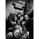 Platon Instagram - reverend joseph lowery, reverend c. t. vivian, andrew young, & reverend fred shuttlesworth. "Today is Martin Luther King Jr. Day. The previous post was a picture of his chair. I can think of no better way to honor this great man's existence than by sharing this story with you. This picture was taken outside Martin Luther King Jr.'s Ebenezer Baptist Church in Atlanta, Georgia. I had the great privilege to invite his closest aids and compatriots to come together one more time underneath the famous neon sign. At the time this picture was taken, the brave and courageous Reverend Fred Shuttlesworth was extremely frail and ill, yet he insisted on traveling a great distance with his family to be part of this historic gathering. His family dressed him in a dapper suit and he arrived at the church in a wheelchair. His presence created a beautiful spirit of reunion -iIt felt as if we were all going back in time. I was deeply concerned, however, about composing and capturing this communion of compassion. Would the wheelchair become a barrier? How would I bring these great men physically together in an everlasting icon of empathy? The neon sign seemed like a great anchor for my composition. These legends gathered underneath the glowing light and instantly surrounded Reverend Shuttlesworth. These men played a pivotal role in the Civil Rights movement in America; their courage and determination was matched by their empathy and hope for a better life. It seemed only natural that as I took this picture they should all say a prayer for the continued battle for human dignity in America. How lucky I am to have caught this majestic moment on film. Since this picture was taken, Fred Shuttlesworth has sadly passed away, and this marks the last time they were all together in prayer. To the brave warriors of the Civil Rights movement, I salute you.”