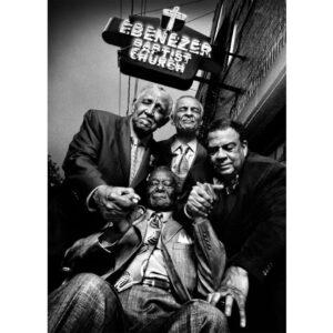 Platon Instagram - reverend joseph lowery, reverend c. t. vivian, andrew young, & reverend fred shuttlesworth. "Today is Martin Luther King Jr. Day. The previous post was a picture of his chair. I can think of no better way to honor this great man's existence than by sharing this story with you.  This picture was taken outside Martin Luther King Jr.'s Ebenezer Baptist Church in Atlanta, Georgia.  I had the great privilege to invite his closest aids and compatriots to come together one more time underneath the famous neon sign. At the time this picture was taken, the brave and courageous Reverend Fred Shuttlesworth was extremely frail and ill, yet he insisted on traveling a great distance with his family to be part of this historic gathering.  His family dressed him in a dapper suit and he arrived at the church in a wheelchair. His presence created a beautiful spirit of reunion -iIt felt as if we were all going back in time.  I was deeply concerned, however, about composing and capturing this communion of compassion.  Would the wheelchair become a barrier? How would I bring these great men physically together in an everlasting icon of empathy? The neon sign seemed like a great anchor for my composition. These legends gathered underneath the glowing light and instantly surrounded Reverend Shuttlesworth. These men played a pivotal role in the Civil Rights movement in America; their courage and determination was matched by their empathy and hope for a better life. It seemed only natural that as I took this picture they should all say a prayer for the continued battle for human dignity in America. How lucky I am to have caught this majestic moment on film. Since this picture was taken, Fred Shuttlesworth has sadly passed away, and this marks the last time they were all together in prayer.  To the brave warriors of the Civil Rights movement, I salute you.”