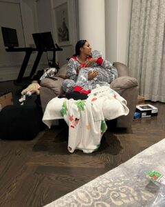 Porsha Williams Guobadia Instagram - I think our best piece of furniture is my recliner! lol I used to sit in it all the time when I was pregnant with Pj to help relieve my hip pains! BUT now it’s the perfect snuggle chair for my whittle family we literally try to beat each other to get in it😂🤗 Oh and yes I force hubby to wear holiday onsies with me almost everyday day 😂🥰 3 christmas later with you ❤️