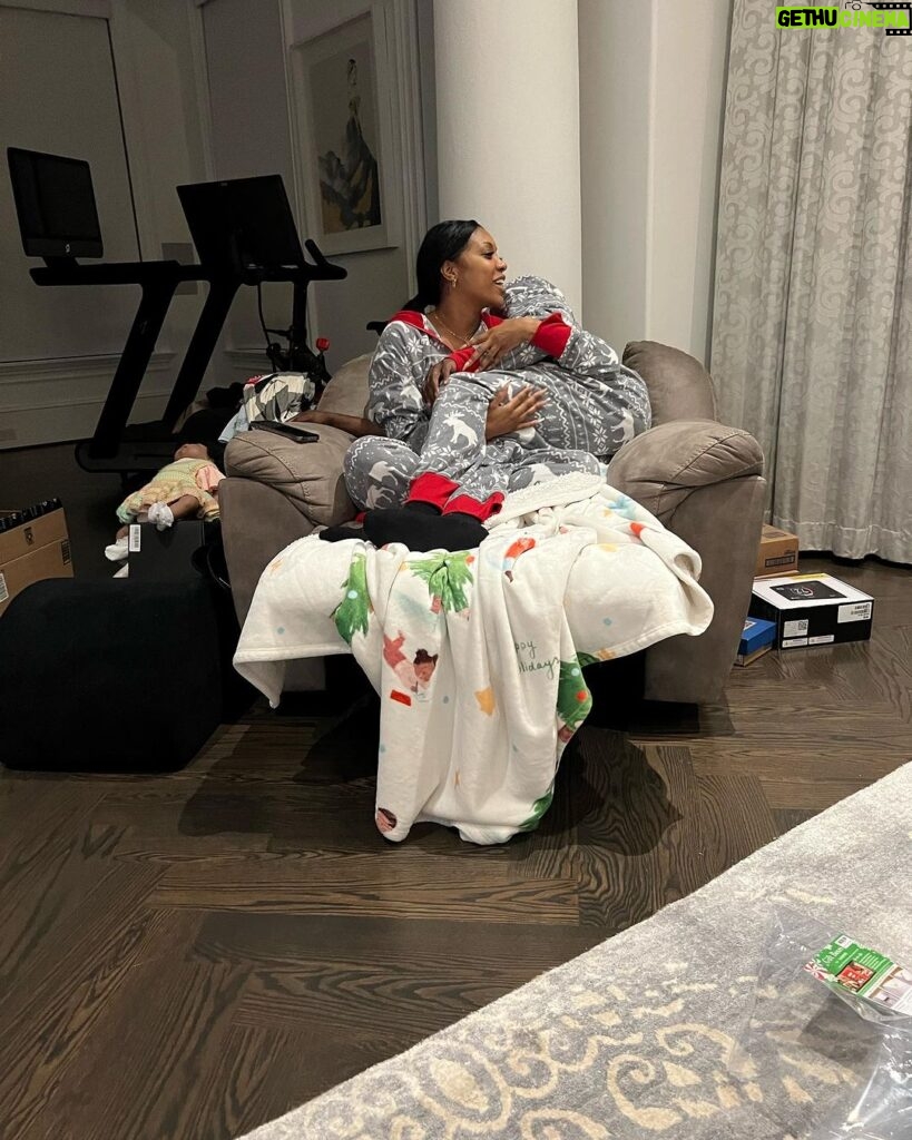 Porsha Williams Guobadia Instagram - I think our best piece of furniture is my recliner! lol I used to sit in it all the time when I was pregnant with Pj to help relieve my hip pains! BUT now it’s the perfect snuggle chair for my whittle family we literally try to beat each other to get in it😂🤗 Oh and yes I force hubby to wear holiday onsies with me almost everyday day 😂🥰 3 christmas later with you ❤️
