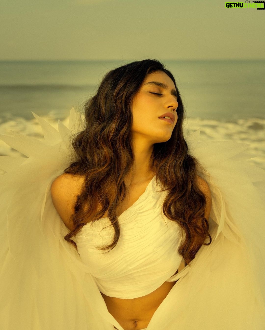 Priya Varrier Instagram - She fell from the skies above; Right onto the lap of his dreams 🕊️ Concept and Photography: @a_isography HMU: @sreegeshvasan_makeupartist Outfit: @jaankibridalcouture Art: @ashi_k_pradeep