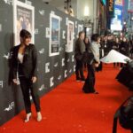 Q’orianka Kilcher Instagram – It was worth the cold windy weather to watch Bardo. 🥶 Thank you to my amazing friend and stylist @dimitryl and @regardstylehouse for this stunning “black tie seductive” tuxedo from @cristallini_official 🤵‍♀️| Earrings by @mahrukh.akuly.jewelry 🫶🏽