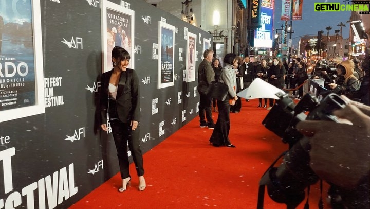 Q'orianka Kilcher Instagram - It was worth the cold windy weather to watch Bardo. 🥶 Thank you to my amazing friend and stylist @dimitryl and @regardstylehouse for this stunning “black tie seductive” tuxedo from @cristallini_official 🤵‍♀️| Earrings by @mahrukh.akuly.jewelry 🫶🏽