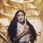 Q'orianka Kilcher Instagram - “There was beauty in the way she held her vulnerability: Brutally soft” - Elle. 🌸Little baby me☺️ I must’ve been about 15 years old when I did this shoot for a magazine. #throwbackthursday thank you for the beautiful poem @elle.poetry
