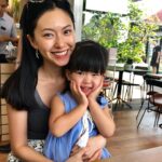 Race Wong Instagram - What a special day. Today marked Cara’s first step into primary school. We spent so much time preparing, right up to last night when I lovingly cut her hair and showered her. Yet, in the morning rush, I somehow forgot to pin on her school badge. 🤪 All I wish for her is to relish the joy of learning, form beautiful friendships, and, oh, not to grow up too swiftly. Sending all my love, love 😢. Planned to give her $3 as pocket money, only to realize the canteen prices have evolved in the last 30 years! 😝 I vividly remember a bowl of noodles being just 50 cents. Ordered a chicken rice instead; it tasted surprisingly good. Thinking of joining as a parent volunteer to be more engaged in her school life. Writing this with a mix of emotions in the canteen; fellow parents might wonder why I’m tearing up. 😂 #P1 #emomummy #love Singapore