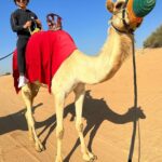 Radzi Chinyanganya Instagram - Riding a camel on hump-day! 🐫🐫🐫🐫🐫🐫🐫 #humpday #dubai #camel #desert #fun #excursion Dubai Desert Safari