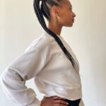 Rae Wynn-Grant Instagram - A lot’s been going on since I last posted (personally & in the world) but would rather focus on how I got my hair braided & look like a @onepeloton instructor & managed to wear a white shirt for a full half-day before getting it stained. It’s the little things sometimes. Also, we’ve been living with a blank bedroom wall for almost 2 years - pls send art recs 🙏🏾. Braids by @alicianicole186 Paparazzi pics by @daveseligman Unintentionally asymmetrical ear piercings by @clairesstores circa 1991 Santa Barbara, California