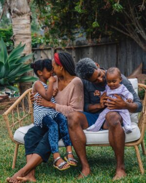 Rae Wynn-Grant Instagram - When a world famous photographer shoots your family in June you make it your holiday card in December 🖤. Happy holidays to everyone! 📸: @celestesloman