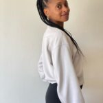 Rae Wynn-Grant Instagram - A lot’s been going on since I last posted (personally & in the world) but would rather focus on how I got my hair braided & look like a @onepeloton instructor & managed to wear a white shirt for a full half-day before getting it stained. It’s the little things sometimes. Also, we’ve been living with a blank bedroom wall for almost 2 years - pls send art recs 🙏🏾. Braids by @alicianicole186 Paparazzi pics by @daveseligman Unintentionally asymmetrical ear piercings by @clairesstores circa 1991 Santa Barbara, California