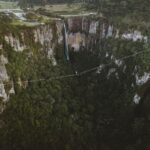 Rafael Bridi Instagram - Pure feeling of freedom This set of photos portraits my good friend @davis_hermes enjoying the openness of the cliffs and huge waterfalls from Urubici Santa Catarine. This location in Brazil is full of potential and has been the best training ground I could ask for #visualoftheearth #turismonosul #exploretocreate #urubici #descubrasc #thegreatoutdoors #voyaged #droneoftheday #fromwhereidrone #trilhandotrilhas #stayandwander #optoutside #discoverearth #earthfocus #santacatarina #aventurassc #highline #slacklining #balancecommunity #outsideculture #lifeofadventure #trilhando #theoriginalgasters