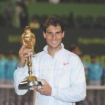 Rafael Nadal Instagram – Hola a todos. Tras los vídeos y fotos que he venido compartiendo, deciros que he estado trabajando para volver a jugar lo antes posible. Me hubiera encantado jugar la semana que viene en Doha pero no me encuentro aún preparado para competir. Muy agradecido al equipo del torneo en Catar, que siempre ha tenido todo tipo de atenciones hacia mí y mi equipo. 🙏🏻 También a todos los fans que siempre me han animado enormemente y a quien echaré de menos. 
Sigo con la preparación para la exhibición en Las Vegas con @carlitosalcarazz y después en el espectacular torneo de Indian Wells.

I would have loved to play in Doha, where the tournament team, as well as the amazing Qatar fans have always supported me greatly. Unfortunately I am yet not ready to compete and I won’t be able to come to Doha where I really wanted to be and play again after that unforgettable win in 2014.
I will focus on keep working to be ready for the exhibition in Las Vegas and the amazing Indian Wells tournament 🙏🏻 Rafa Nadal Academy