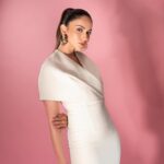 Rakul Preet Singh Instagram - White swan 🤍 Outfit @safiyaa_official Earrings @amamajewels Ring @misho_designs Footwear @rossobrunelloofficial Styled by @anshikaav Assisted by @bhatia_tanisha Makeup @im__sal Hair @aliyashaik28 Shot by @deepak_das_photography