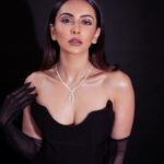 Rakul Preet Singh Instagram - Black is mystery 🖤 Outfit @stada_couture Jewellery @notandas_jewellers Gloves @labelankitajain Footwear @rossobrunelloofficial Styled by @anshikaav Assisted by @bhatia_tanisha Makeup @im__sal Hair @aliyashaik28 Shot by @deepak_das_photography