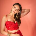 Rakul Preet Singh Instagram - Life is simple , it’s either cherry red or any other red ❤️ Outfit @shivanandnarresh Earrings @abhilasha_pret_jewelery Ring @abhilasha_pret_jewelery Bangles @sachdeva.ritika Styled by @anshikaav Assisted by @bhatia_tanisha Makeup @im__sal Hair @aliyashaik28 Photographer- @deepak_das_photography