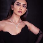Rakul Preet Singh Instagram - Black is mystery 🖤 Outfit @stada_couture Jewellery @notandas_jewellers Gloves @labelankitajain Footwear @rossobrunelloofficial Styled by @anshikaav Assisted by @bhatia_tanisha Makeup @im__sal Hair @aliyashaik28 Shot by @deepak_das_photography