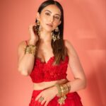 Rakul Preet Singh Instagram - Life is simple , it’s either cherry red or any other red ❤️ Outfit @shivanandnarresh Earrings @abhilasha_pret_jewelery Ring @abhilasha_pret_jewelery Bangles @sachdeva.ritika Styled by @anshikaav Assisted by @bhatia_tanisha Makeup @im__sal Hair @aliyashaik28 Photographer- @deepak_das_photography