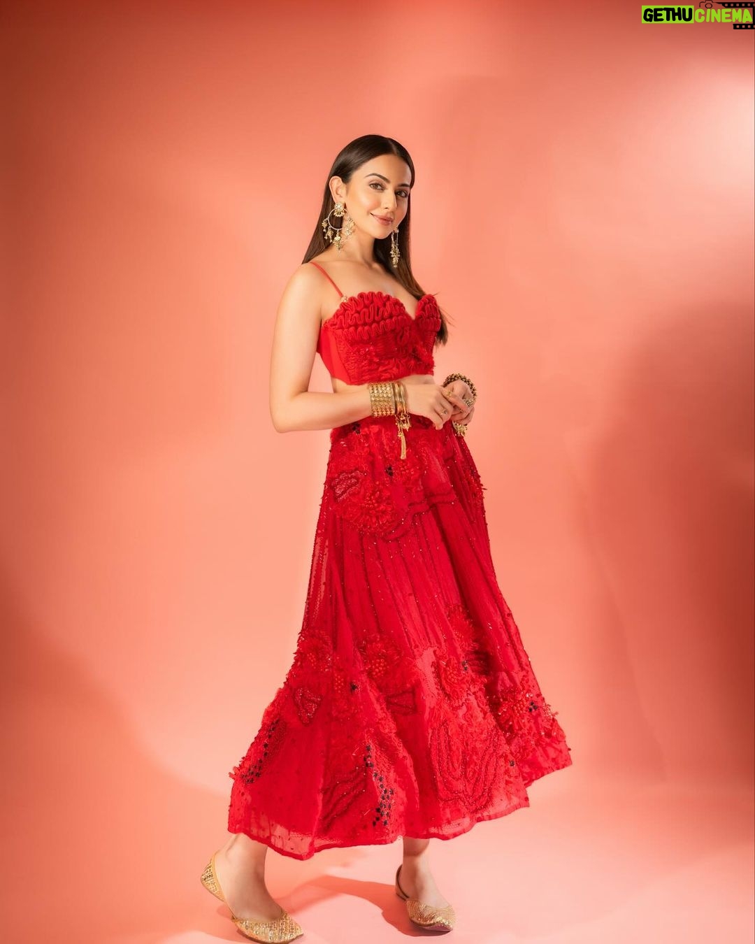 Rakul Preet Singh Instagram - Life is simple , it’s either cherry red or any other red ❤️ Outfit @shivanandnarresh Earrings @abhilasha_pret_jewelery Ring @abhilasha_pret_jewelery Bangles @sachdeva.ritika Styled by @anshikaav Assisted by @bhatia_tanisha Makeup @im__sal Hair @aliyashaik28 Photographer- @deepak_das_photography