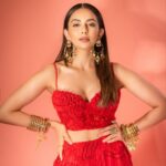Rakul Preet Singh Instagram - Life is simple , it’s either cherry red or any other red ❤️ Outfit @shivanandnarresh Earrings @abhilasha_pret_jewelery Ring @abhilasha_pret_jewelery Bangles @sachdeva.ritika Styled by @anshikaav Assisted by @bhatia_tanisha Makeup @im__sal Hair @aliyashaik28 Photographer- @deepak_das_photography