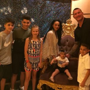Randy Orton Instagram - I don’t think there’s any question whether or not I love you. But I could always do better showing it. I ain’t perfect, but I want you to know that my love for you is as close to perfect as your ‘mom skills’ are. Today is Mother’s Day, and I’ve never seen a better example of what it means to be ‘mom’. You are putting outfits together, making school lunches,  cleaning up, doing laundry daily it seems, dinner every night, wiping asses (mine included) picking up dirty socks towels clothes etc, cleaning cleaning cleaning, driving kids to and from school/practice and yes detention (Rob), grocery shopping (still hard even though you found the app for delivery), dentist, eye dr, pediatrician, school conferences, and when it’s time for class or team moms to do their thing, look tf out, all the practices, all the games, every holiday it looks like Santa the Easter bunny, or Jack Skelington vomited in our home with all the decorations (she wins awards guys), theCovid tests for vaca’s, packing for 6 ( harder then it sounds), making every appointment for EVERYTHING..... and you somehow find the time for all of us, even though you don’t have any time for yourself. I wish I could somehow make your life easier, but when it comes down to it you are a real life super hero, and all I can do is sit back and watch....wait.... and look forward to when it’s my turn for some attention. Trust me, when I say, there’s nothing better then having you to myself, I mean it x 100. I love you, and you are the greatest mother in the entire world @kim.orton01 ❤️HAPPY MOTHERS DAY!