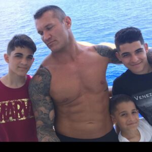 Randy Orton Instagram - I don’t think there’s any question whether or not I love you. But I could always do better showing it. I ain’t perfect, but I want you to know that my love for you is as close to perfect as your ‘mom skills’ are. Today is Mother’s Day, and I’ve never seen a better example of what it means to be ‘mom’. You are putting outfits together, making school lunches,  cleaning up, doing laundry daily it seems, dinner every night, wiping asses (mine included) picking up dirty socks towels clothes etc, cleaning cleaning cleaning, driving kids to and from school/practice and yes detention (Rob), grocery shopping (still hard even though you found the app for delivery), dentist, eye dr, pediatrician, school conferences, and when it’s time for class or team moms to do their thing, look tf out, all the practices, all the games, every holiday it looks like Santa the Easter bunny, or Jack Skelington vomited in our home with all the decorations (she wins awards guys), theCovid tests for vaca’s, packing for 6 ( harder then it sounds), making every appointment for EVERYTHING..... and you somehow find the time for all of us, even though you don’t have any time for yourself. I wish I could somehow make your life easier, but when it comes down to it you are a real life super hero, and all I can do is sit back and watch....wait.... and look forward to when it’s my turn for some attention. Trust me, when I say, there’s nothing better then having you to myself, I mean it x 100. I love you, and you are the greatest mother in the entire world @kim.orton01 ❤️HAPPY MOTHERS DAY!