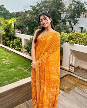 Rashmika Mandanna Instagram - So it’s been almost 6-7 years since I’ve known Sai and his family and 2 days back he - who’s also like a family to me, got married and I had the opportunity to be a part of his big day.. ❤️❤️ 
It makes me so happy to see these lovely people around me grow into such amazing human beings and it’s so nice to see all of them so happy. 🤍 
I tho still can’t believe he’s married now..🙊😄 but it truly makes me super happy. ❤️
Congratulations @saibabu2223 and Preethi.. 🤗
god bless you with all my heart. 
I wish your lives are filled with happiness always. 🤍🌻