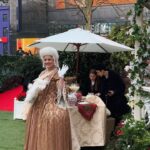 Rebecca Flint Instagram - a new story awaits 📝 I had the pleasure of watching the brand new @bridgertonnetflix series: Queen Charlotte 👑 You know I’m such a huge fan of this show, I love how fun it is and how accessible it makes enjoyment of the aesthetics and fantasy of the Regency era! Netflix held a beautiful garden party in the heart of Leicester Square 📍with afternoon tea, toasts, astronomers, and the best dressed guests I’ve ever seen 😊 If you’re a fan of the Bridgerton universe, this prequel comes out on 4th May, be there! 🐎 #queencharlotte #queencharlottegardenparty #bridgerton #netflix #vintagelauraashley #lauraashley #lauraashleyuk #thisjaneaustenlife #lafemmeparisienne #coquettefashion #parisiennegirl #asecondofwhimsey #amomentofwonder #meadowcore #warmcore #vintagecore #quietchaotics #monlook #embracingtheseasons