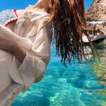 Rebecca Flint Instagram - contemplating mermaidhood at paradise beach 🧜‍♀️ ⁣ ⁣ 01: A Mermaid, John William Waterhouse, 1901 🎨⁣ ⁣ 02: Mermaids Frolicking in the Sea, Charles-Édouard Boutibonne, 1883 🌊⁣ ⁣ I explored the Greek Island coasts last week with my friends for a dreamy summer holiday 😊 I’m often nervous of boats but luckily I had a great time and no troubles. I’ve been working hard lately so it was a delight to relax in the salty sun!